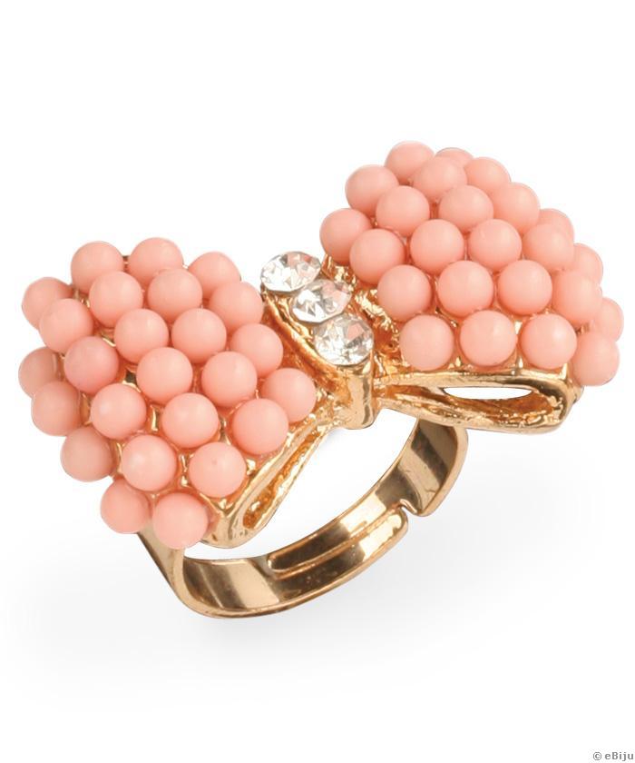 Rózsaszín masni gyűrű gyöngyökkel és kristályokkal